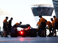 McLaren mechanics during the Formula 1 post-season testing at Yas Marina Cicuit in Abu Dhabi, United Arab Emirates on December 10, 2024. (