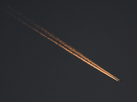 A plane flies during the Formula 1 post-season testing at Yas Marina Cicuit in Abu Dhabi, United Arab Emirates on December 10, 2024. (