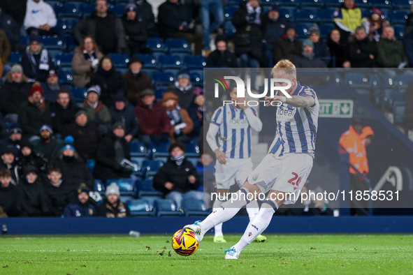 Uros Racic of WBA attempts a shot on goal in the final minutes of the game during the Sky Bet Championship match between West Bromwich Albio...