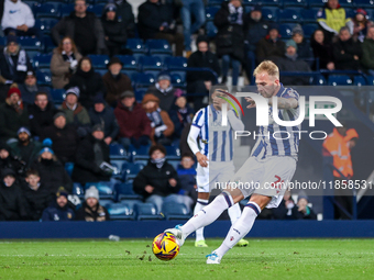 Uros Racic of WBA attempts a shot on goal in the final minutes of the game during the Sky Bet Championship match between West Bromwich Albio...