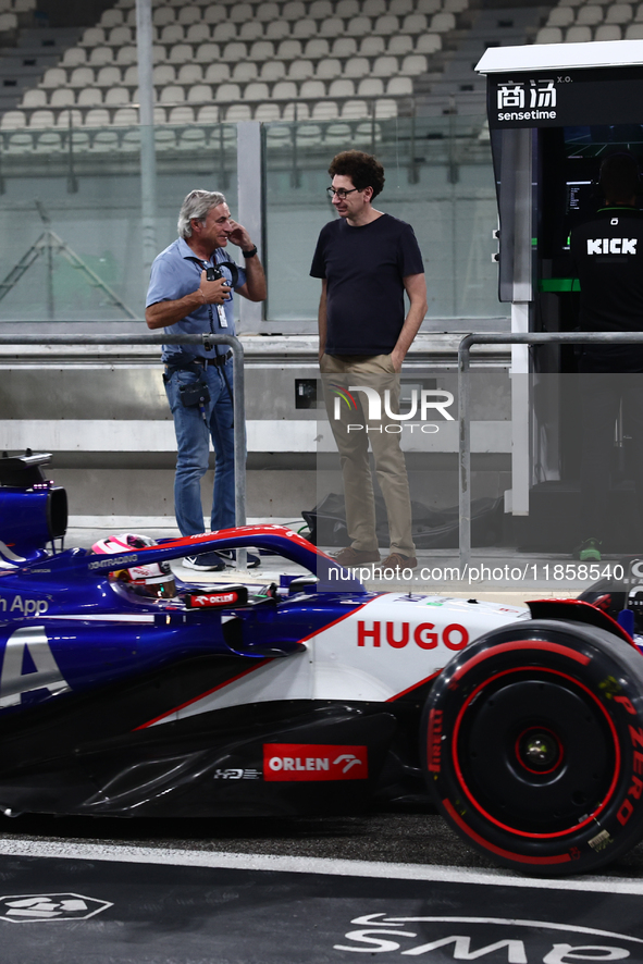 Carlos Sainz and Mattia Binotto during the Formula 1 post-season testing at Yas Marina Cicuit in Abu Dhabi, United Arab Emirates on December...