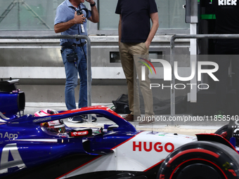 Carlos Sainz and Mattia Binotto during the Formula 1 post-season testing at Yas Marina Cicuit in Abu Dhabi, United Arab Emirates on December...