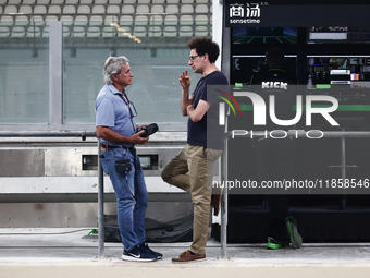 Carlos Sainz and Mattia Binotto during the Formula 1 post-season testing at Yas Marina Cicuit in Abu Dhabi, United Arab Emirates on December...