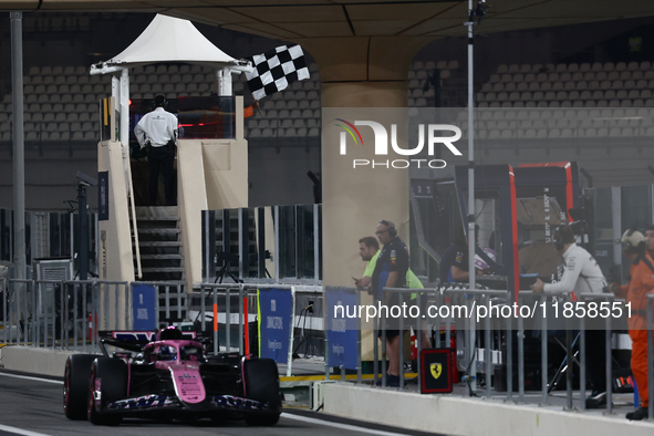 Checquered flag and Paul Aron during the Formula 1 post-season testing at Yas Marina Cicuit in Abu Dhabi, United Arab Emirates on December 1...