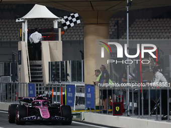 Checquered flag and Paul Aron during the Formula 1 post-season testing at Yas Marina Cicuit in Abu Dhabi, United Arab Emirates on December 1...