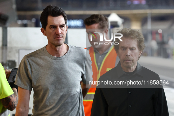 Joseph Kosinski and Jerry Bruckheimer during the Formula 1 post-season testing at Yas Marina Cicuit in Abu Dhabi, United Arab Emirates on De...