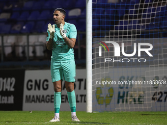 Tamworth's Jas Singh encourages his defence during the The Isuzu FA Trophy Third Round match between Hartlepool United and Tamworth at Victo...