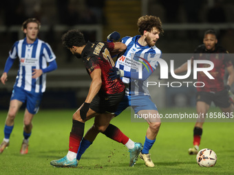 Hartlepool United's Anthony Mancini battles with Tamworth's Luke Fairlamb during the The Isuzu FA Trophy Third Round match between Hartlepoo...