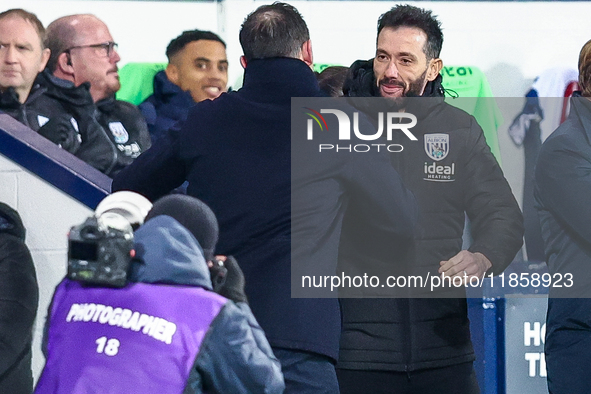 Frank Lampard, manager of Coventry greets Carlos Corber?n, manager of WBA ahead of kick off during the Sky Bet Championship match between We...