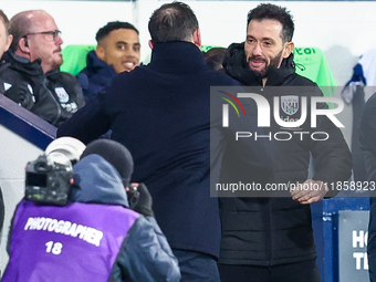 Frank Lampard, manager of Coventry greets Carlos Corber?n, manager of WBA ahead of kick off during the Sky Bet Championship match between We...