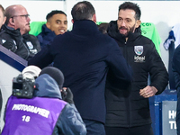 Frank Lampard, manager of Coventry greets Carlos Corber?n, manager of WBA ahead of kick off during the Sky Bet Championship match between We...