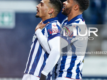 #18, Karlan Grant of WBA is congratulated for his goal by #2, Darnell Furlong during the Sky Bet Championship match between West Bromwich Al...