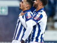 #18, Karlan Grant of WBA is congratulated for his goal by #2, Darnell Furlong during the Sky Bet Championship match between West Bromwich Al...