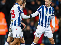 #18, Karlan Grant of WBA is congratulated for his goal by #7, Jed Wallace during the Sky Bet Championship match between West Bromwich Albion...