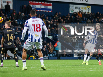 #7, Jed Wallace of WBA takes a shot pressed by #37, Norman Bassette of Coventry during the Sky Bet Championship match between West Bromwich...