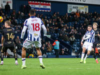 #7, Jed Wallace of WBA takes a shot pressed by #37, Norman Bassette of Coventry during the Sky Bet Championship match between West Bromwich...