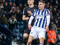 #7, Jed Wallace of WBA/ & #37, Norman Bassette of Coventry in action during the Sky Bet Championship match between West Bromwich Albion and...