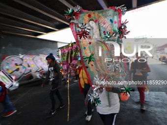 Thousands of Catholic pilgrims continue their journey to the Basilica of Guadalupe for the religious celebration of the Virgin of Guadalupe...