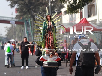 Thousands of Catholic pilgrims continue their journey to the Basilica of Guadalupe for the religious celebration of the Virgin of Guadalupe...