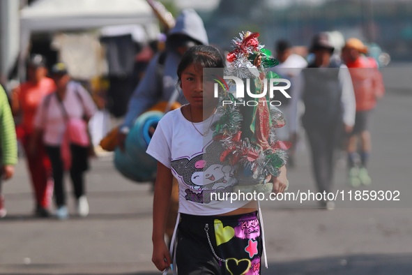 Thousands of Catholic pilgrims continue their journey to the Basilica of Guadalupe for the religious celebration of the Virgin of Guadalupe...