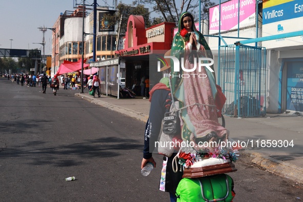 Thousands of Catholic pilgrims continue their journey to the Basilica of Guadalupe for the religious celebration of the Virgin of Guadalupe...