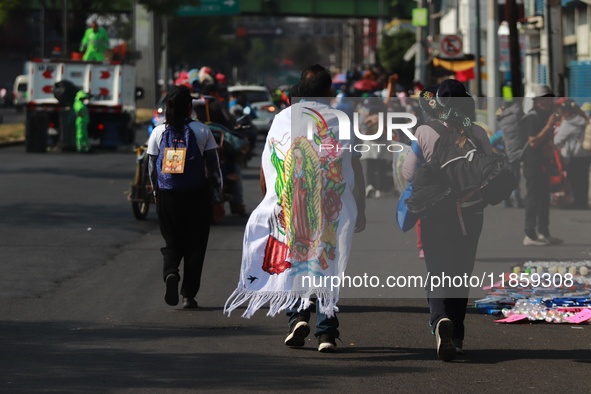 Thousands of Catholic pilgrims continue their journey to the Basilica of Guadalupe for the religious celebration of the Virgin of Guadalupe...