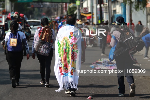 Thousands of Catholic pilgrims continue their journey to the Basilica of Guadalupe for the religious celebration of the Virgin of Guadalupe...