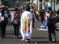 Thousands of Catholic pilgrims continue their journey to the Basilica of Guadalupe for the religious celebration of the Virgin of Guadalupe...