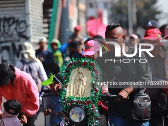 Thousands of Catholic pilgrims continue their journey to the Basilica of Guadalupe for the religious celebration of the Virgin of Guadalupe...