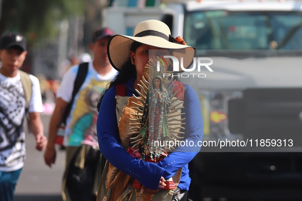 Thousands of Catholic pilgrims continue their journey to the Basilica of Guadalupe for the religious celebration of the Virgin of Guadalupe...