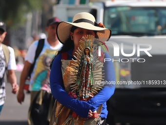 Thousands of Catholic pilgrims continue their journey to the Basilica of Guadalupe for the religious celebration of the Virgin of Guadalupe...