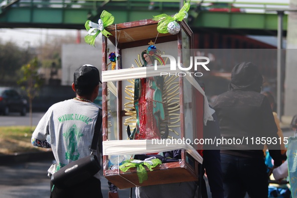 Thousands of Catholic pilgrims continue their journey to the Basilica of Guadalupe for the religious celebration of the Virgin of Guadalupe...