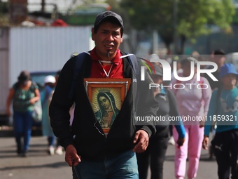 Thousands of Catholic pilgrims continue their journey to the Basilica of Guadalupe for the religious celebration of the Virgin of Guadalupe...