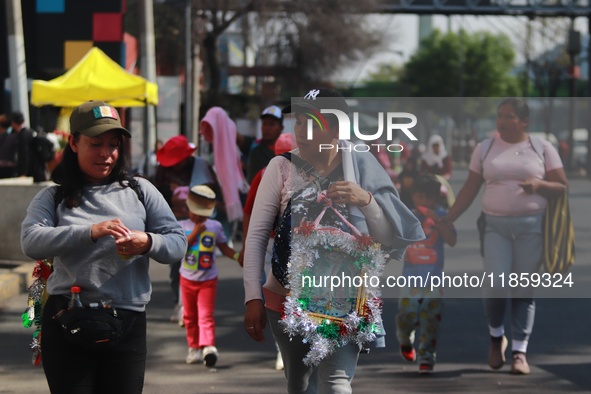 Thousands of Catholic pilgrims continue their journey to the Basilica of Guadalupe for the religious celebration of the Virgin of Guadalupe...