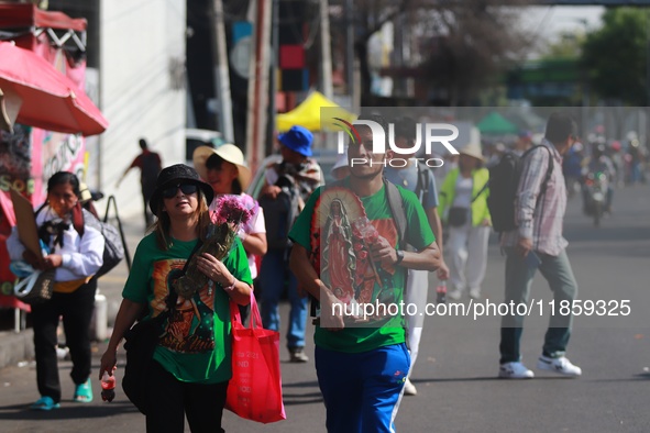 Thousands of Catholic pilgrims continue their journey to the Basilica of Guadalupe for the religious celebration of the Virgin of Guadalupe...