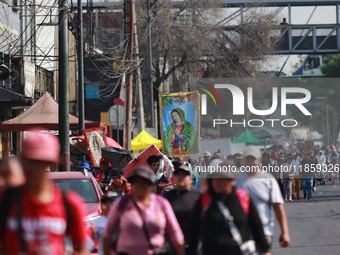 Thousands of Catholic pilgrims continue their journey to the Basilica of Guadalupe for the religious celebration of the Virgin of Guadalupe...