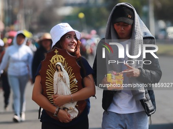 Thousands of Catholic pilgrims continue their journey to the Basilica of Guadalupe for the religious celebration of the Virgin of Guadalupe...