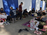 Pilgrims from different states of the Mexican Republic eat on the street during their journey to the Basilica of Guadalupe located in Mexico...