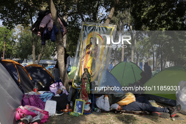 Pilgrims from different states of the Mexican Republic attend the Basilica of Guadalupe in Mexico City, Mexico, on December 11, 2024, for th...