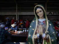 Pilgrims from different states of the Mexican Republic eat at a hostel during their journey to the Basilica of Guadalupe in Mexico City, Mex...