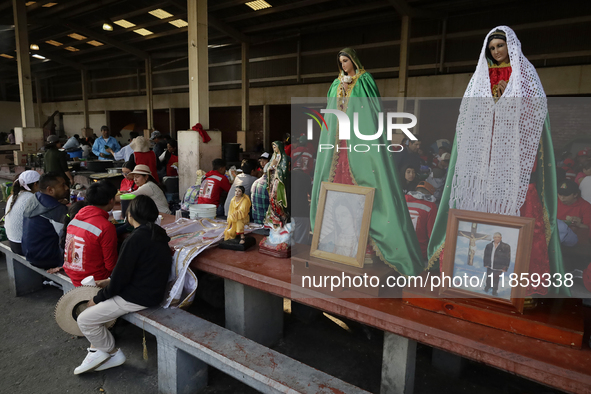 Pilgrims from different states of the Mexican Republic eat at a hostel during their journey to the Basilica of Guadalupe in Mexico City, Mex...