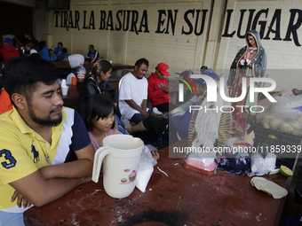 Pilgrims from different states of the Mexican Republic eat at a hostel during their journey to the Basilica of Guadalupe in Mexico City, Mex...