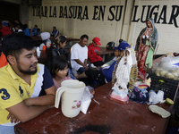 Pilgrims from different states of the Mexican Republic eat at a hostel during their journey to the Basilica of Guadalupe in Mexico City, Mex...