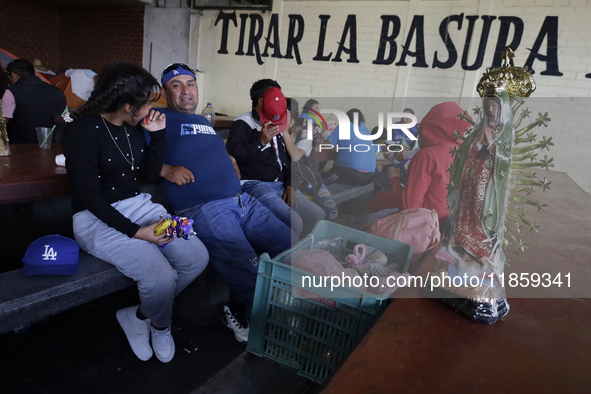 Pilgrims from different states of the Mexican Republic eat at a hostel during their journey to the Basilica of Guadalupe in Mexico City, Mex...