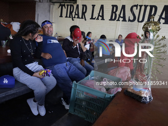 Pilgrims from different states of the Mexican Republic eat at a hostel during their journey to the Basilica of Guadalupe in Mexico City, Mex...