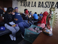 Pilgrims from different states of the Mexican Republic eat at a hostel during their journey to the Basilica of Guadalupe in Mexico City, Mex...