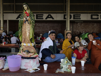 Pilgrims from different states of the Mexican Republic eat at a hostel during their journey to the Basilica of Guadalupe in Mexico City, Mex...