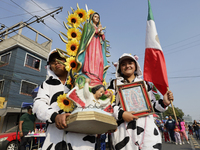 Pilgrims from different states of the Mexican Republic pose during their journey to the Basilica of Guadalupe in Mexico City, Mexico, on Dec...