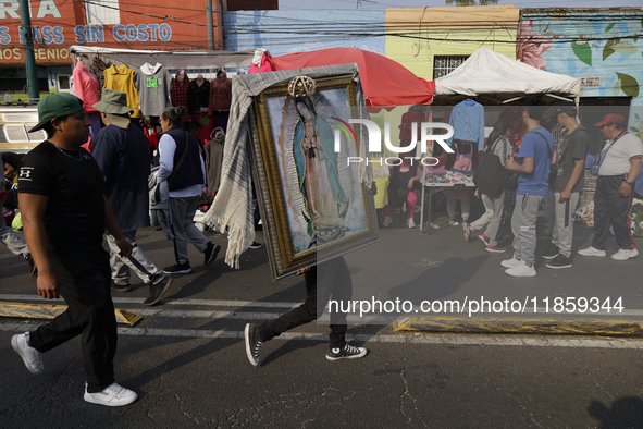 Pilgrims from different states of the Mexican Republic attend the Basilica of Guadalupe in Mexico City, Mexico, on December 11, 2024, for th...