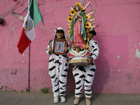 Pilgrims from different states of the Mexican Republic pose during their journey to the Basilica of Guadalupe in Mexico City, Mexico, on Dec...